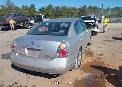 2002 Nissan Altima 2.5 S из США, поврежденный, VIN 1N4AL11E22C209792